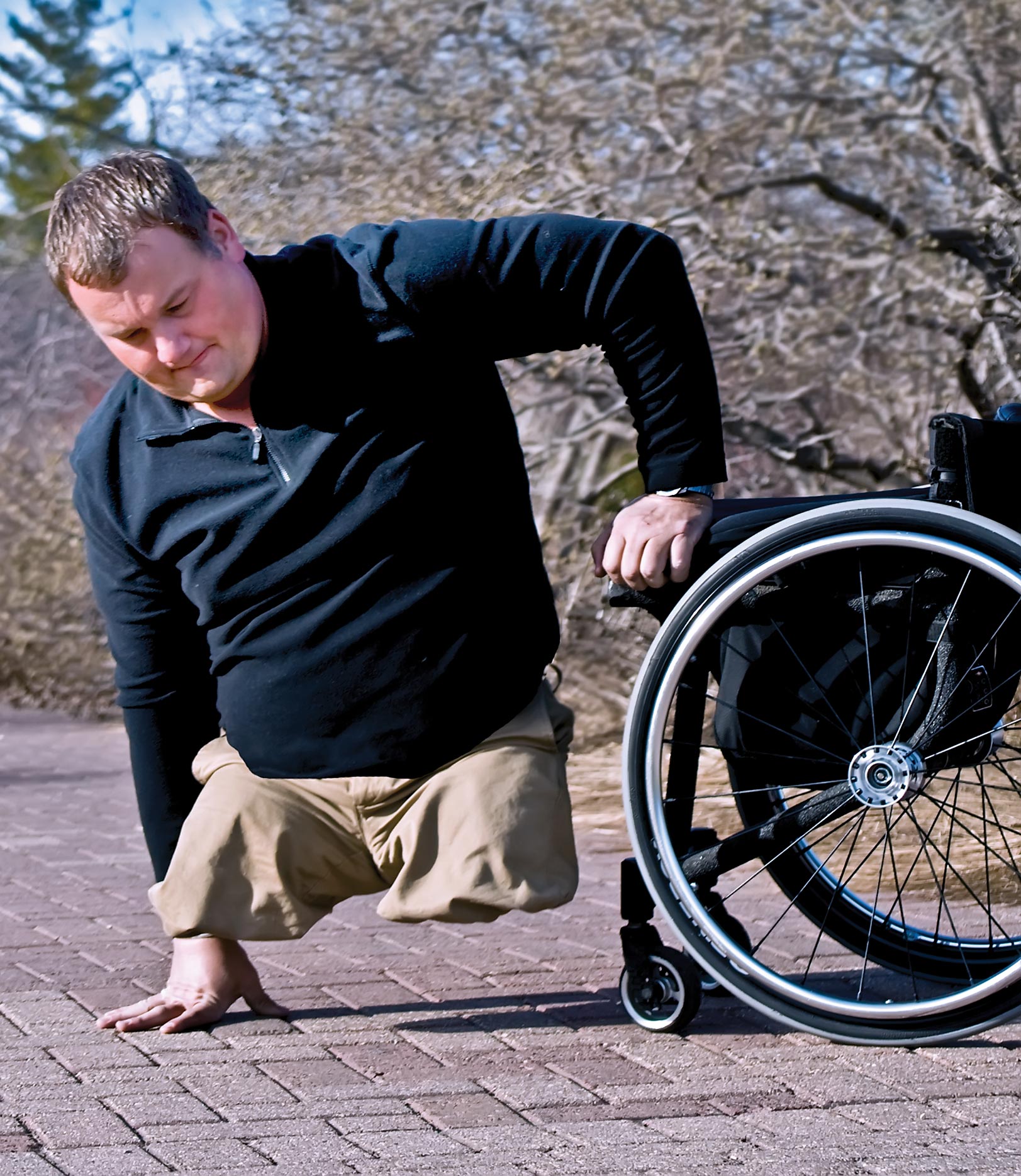 Image of Matt transferring out of his Chair.